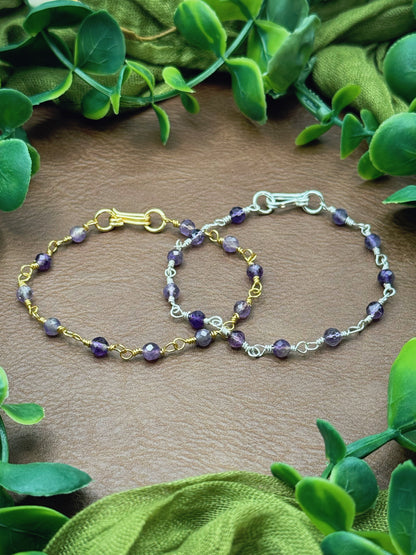 Handmade beaded chain bracelet featuring wire links and purple amethyst beads.