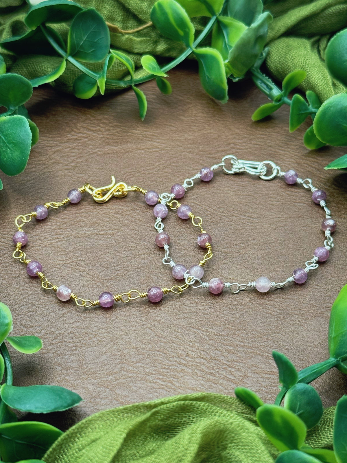 Handmade beaded chain bracelet featuring wire links and purplish pink lepidolite gemstone beads.