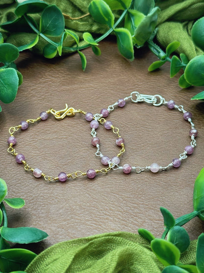 Handmade beaded chain bracelet featuring wire links and purplish pink lepidolite gemstone beads.