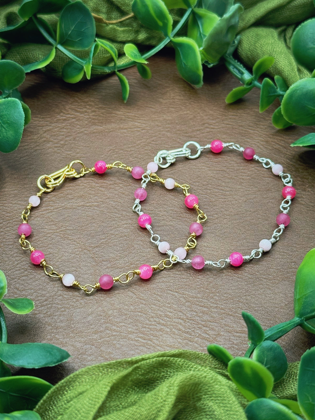 Handmade beaded chain bracelet featuring wire links and pink beads.