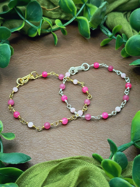 Handmade beaded chain bracelet featuring wire links and pink beads.